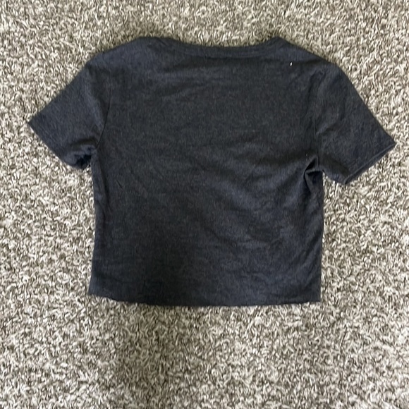 His is a cropped tee with nothing on it! Very easy to style and super cute! - Picture 2 of 2